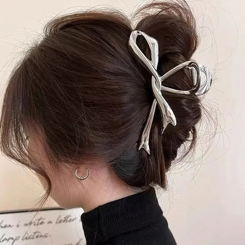 https://ae01.alicdn.com/kf/Sb50a1ffdf0dd455a80dbdcc76b41efefr/Elegant-Bow-Metal-Hair-Claw-Clips-for-Women-Gold-Silver-Geometric-Grab-Clip-Korean-Girls-Hollow.png